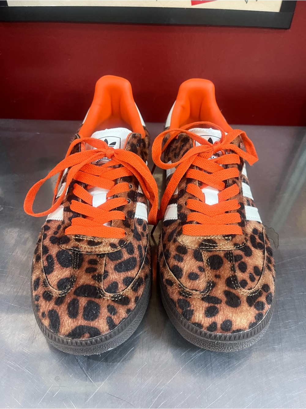 adidas women’s Leopard Print Sneakers with Orange Laces